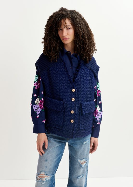 Navy blue sleeveless knitted jacket