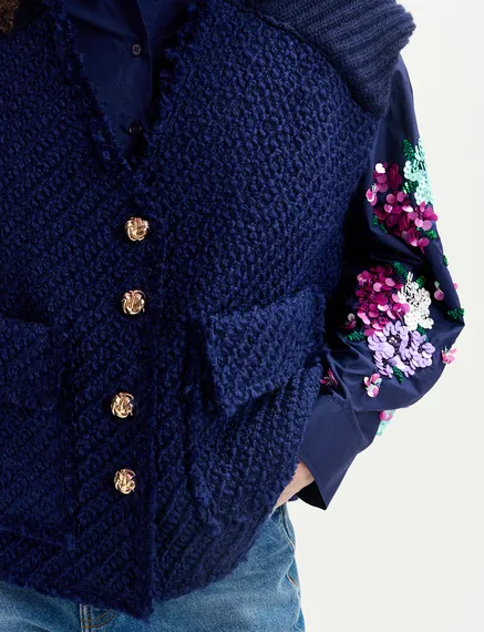 Navy blue sleeveless knitted jacket