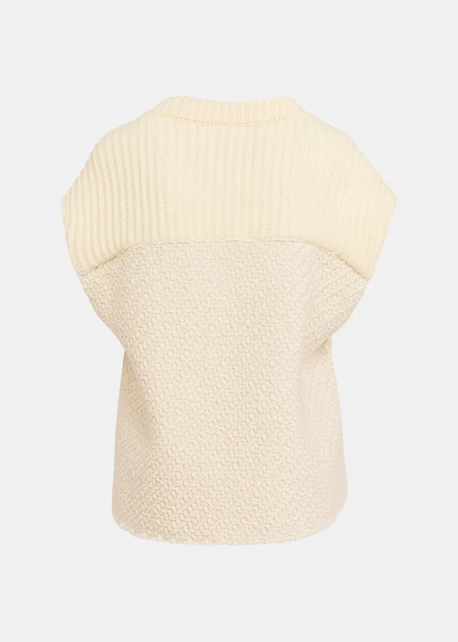 Ecru sleeveless knitted jacket