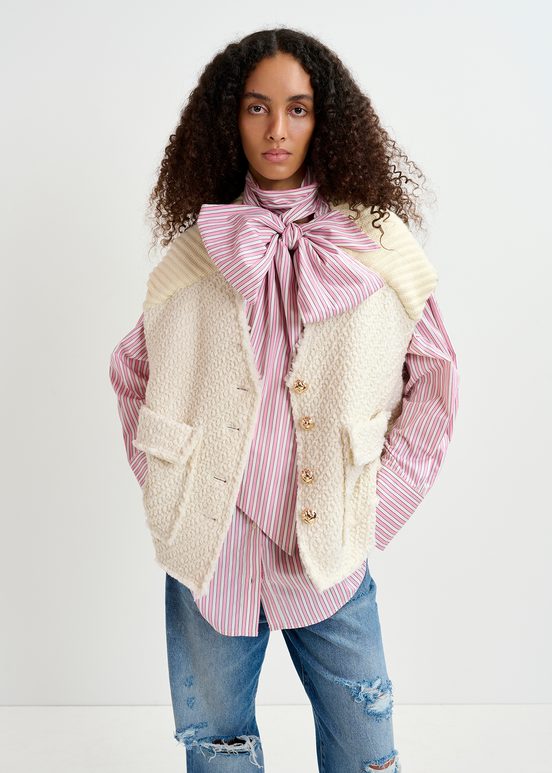 Ecru sleeveless knitted jacket