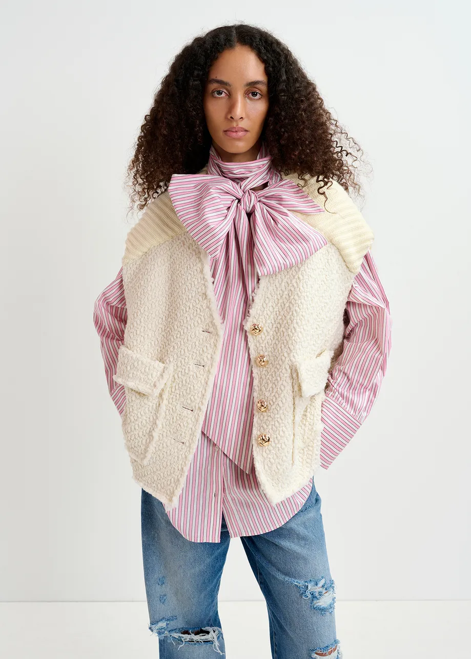 Ecru sleeveless knitted jacket