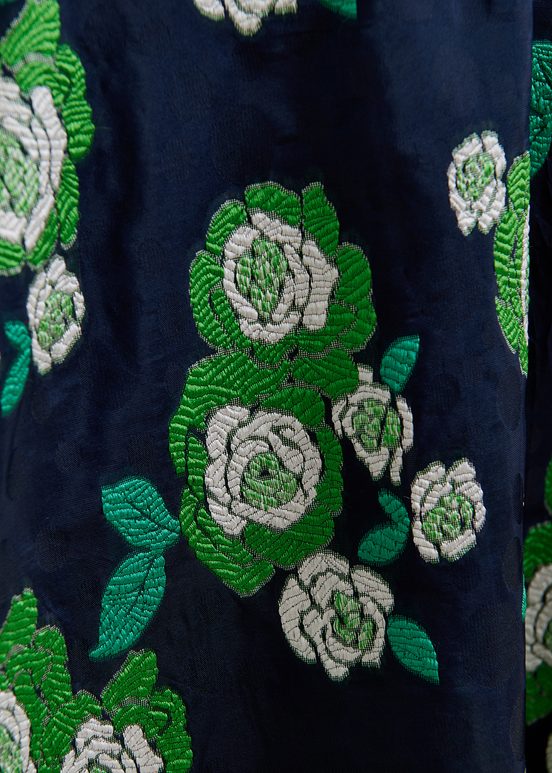 Jupe mi-longue bleu marine en jacquard fleuri