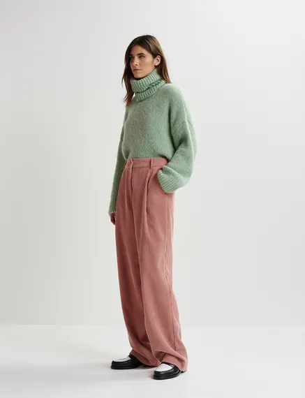 Pantalon fuselé en velours côtelé vieux rose