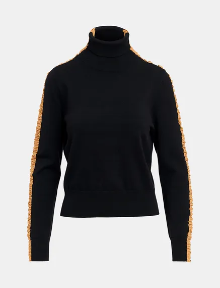 Black turtleneck knit sweater with golden stripes