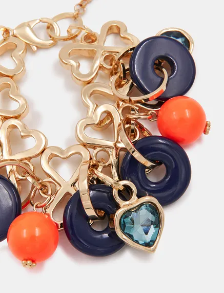 Gold-tone heart-shaped chain bracelet with resin charms