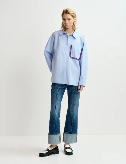 Light blue cotton shirt with beaded embroidery