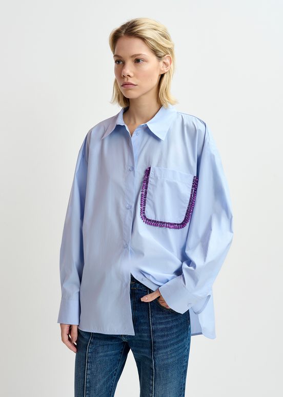 Camicia azzurra in cotone con ricamo con perline