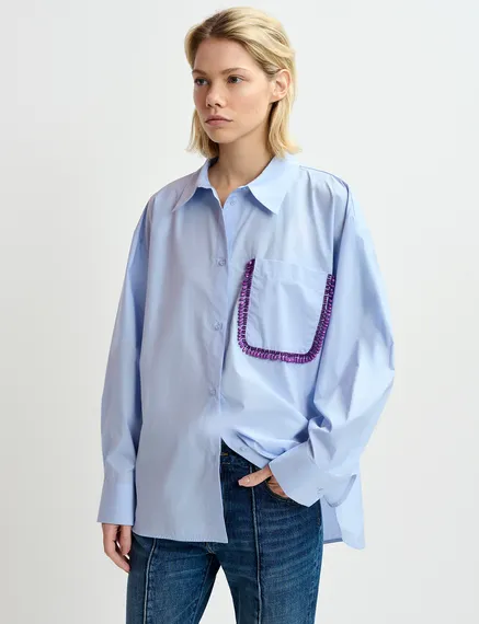 Camicia azzurra in cotone con ricamo con perline