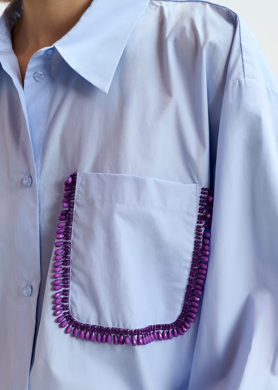 Light blue cotton shirt with beaded embroidery