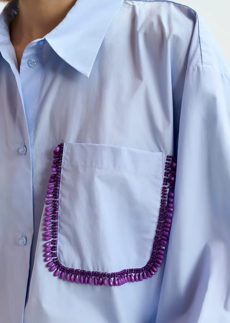 Light blue cotton shirt with beaded embroidery