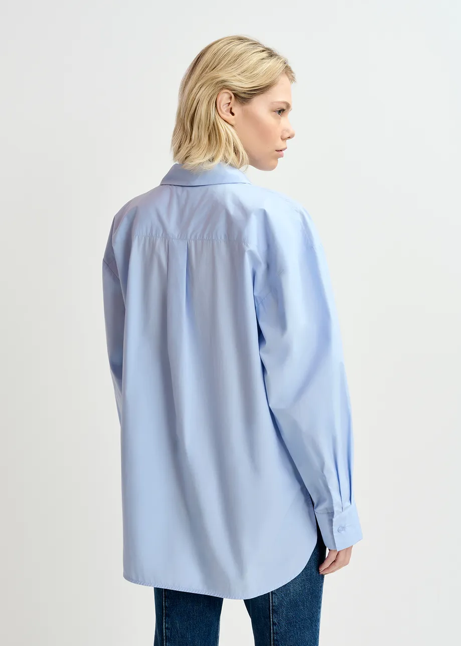 Light blue cotton shirt with beaded embroidery