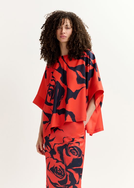 Top oversize rosso con stampa floreale