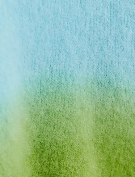 Maglione celeste e verde con effetto sfumato