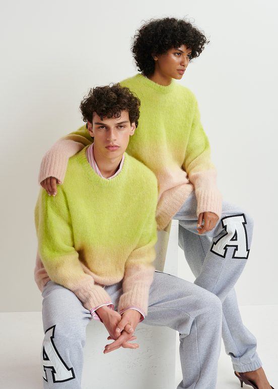 Lime green and light pink knit sweater with gradient effect