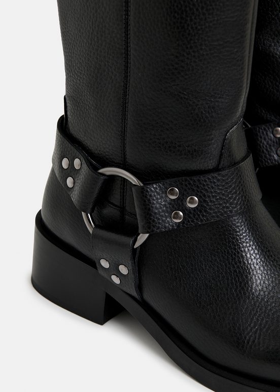 Black leather buckled boots