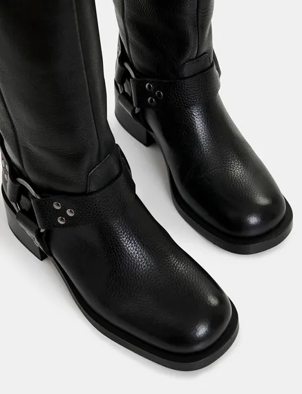 Black leather buckled boots