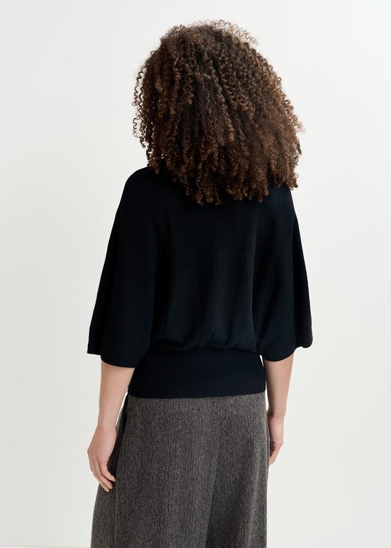 Black cape-effect knit sweater with embellishments