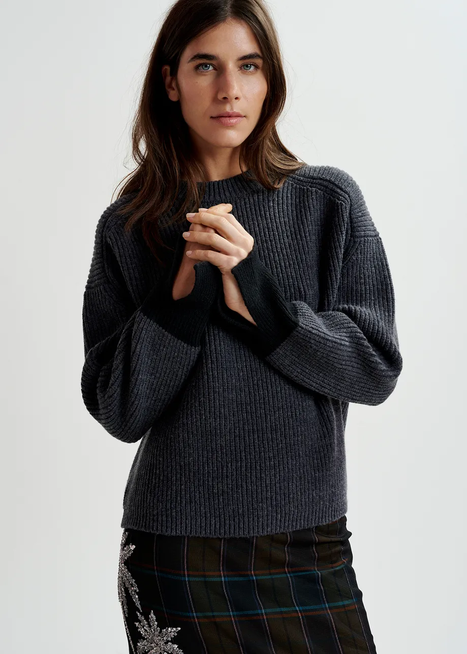 Dark grey knit sweater with contrasting cuffs