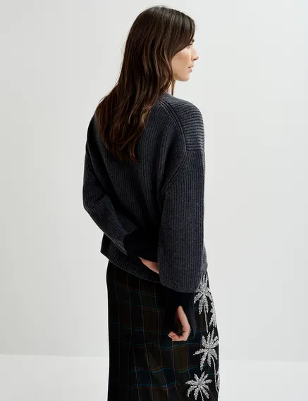 Dark grey knit sweater with contrasting cuffs