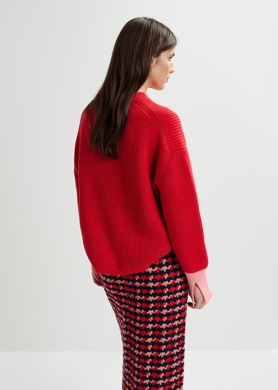 Red knit sweater with contrasting cuffs