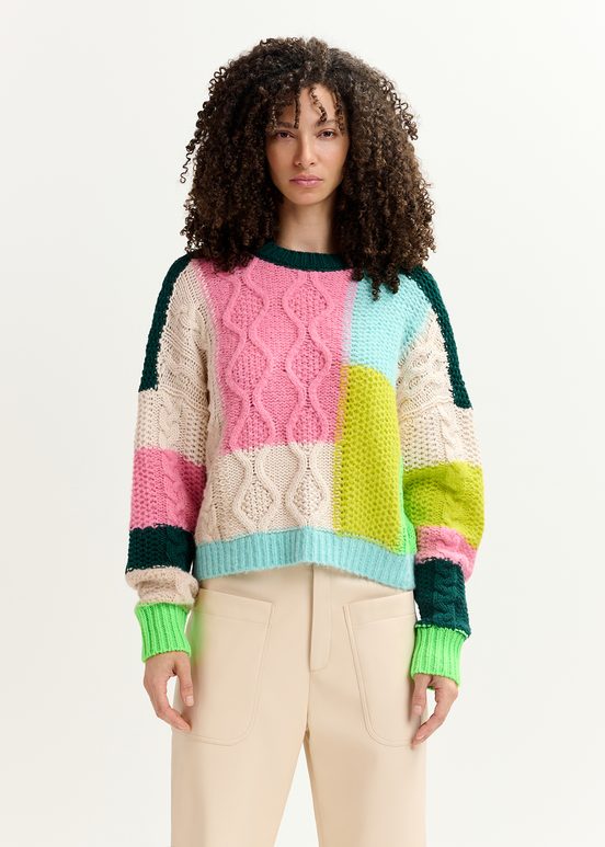 Ecru, lime green and pink cable-knitted patchwork sweater