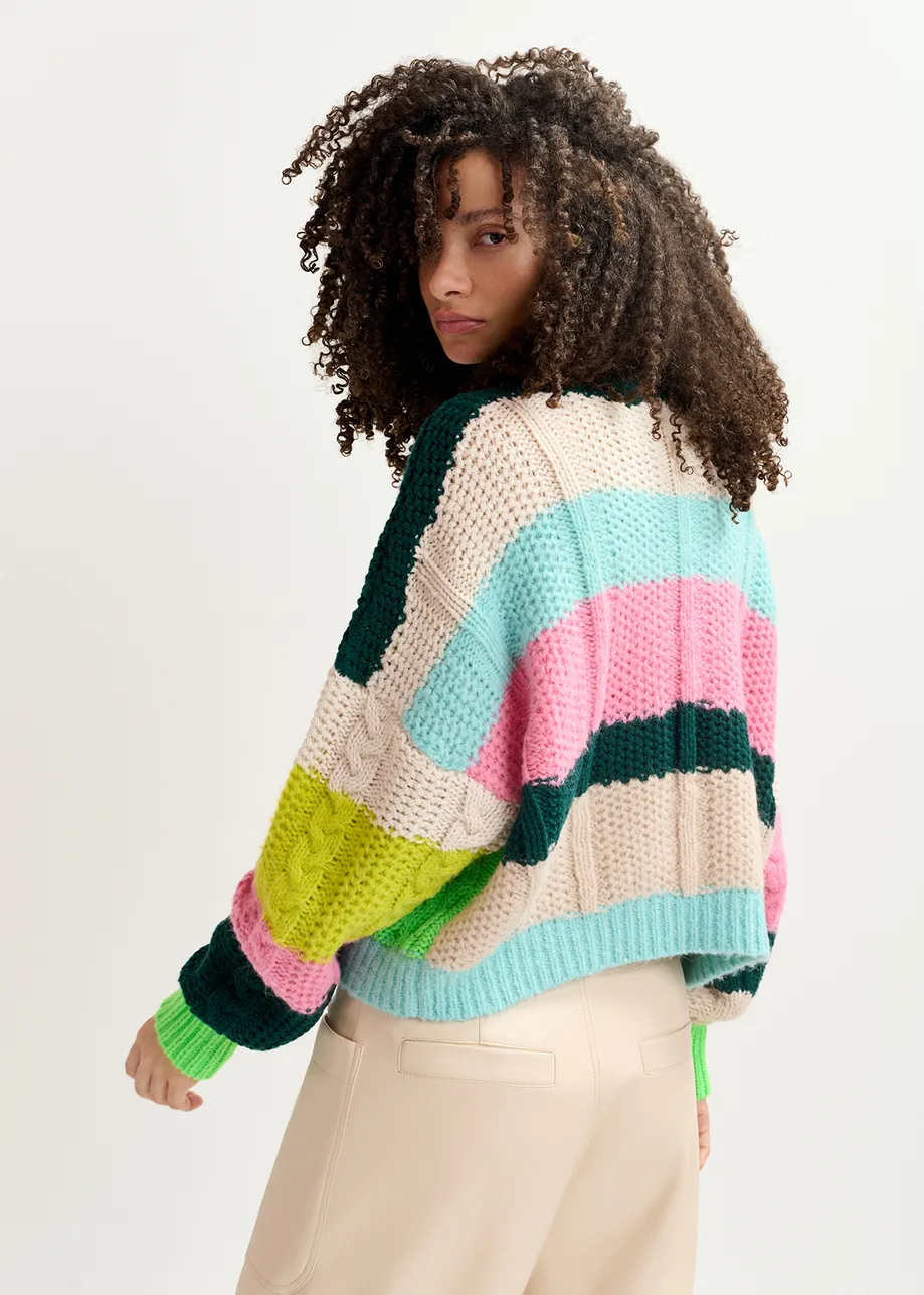 Ecru, lime green and pink cable-knitted patchwork sweater