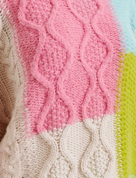 Ecru, lime green and pink cable-knitted patchwork sweater