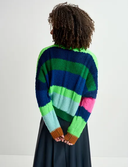 Navy blue, green and neon pink cable-knitted patchwork sweater