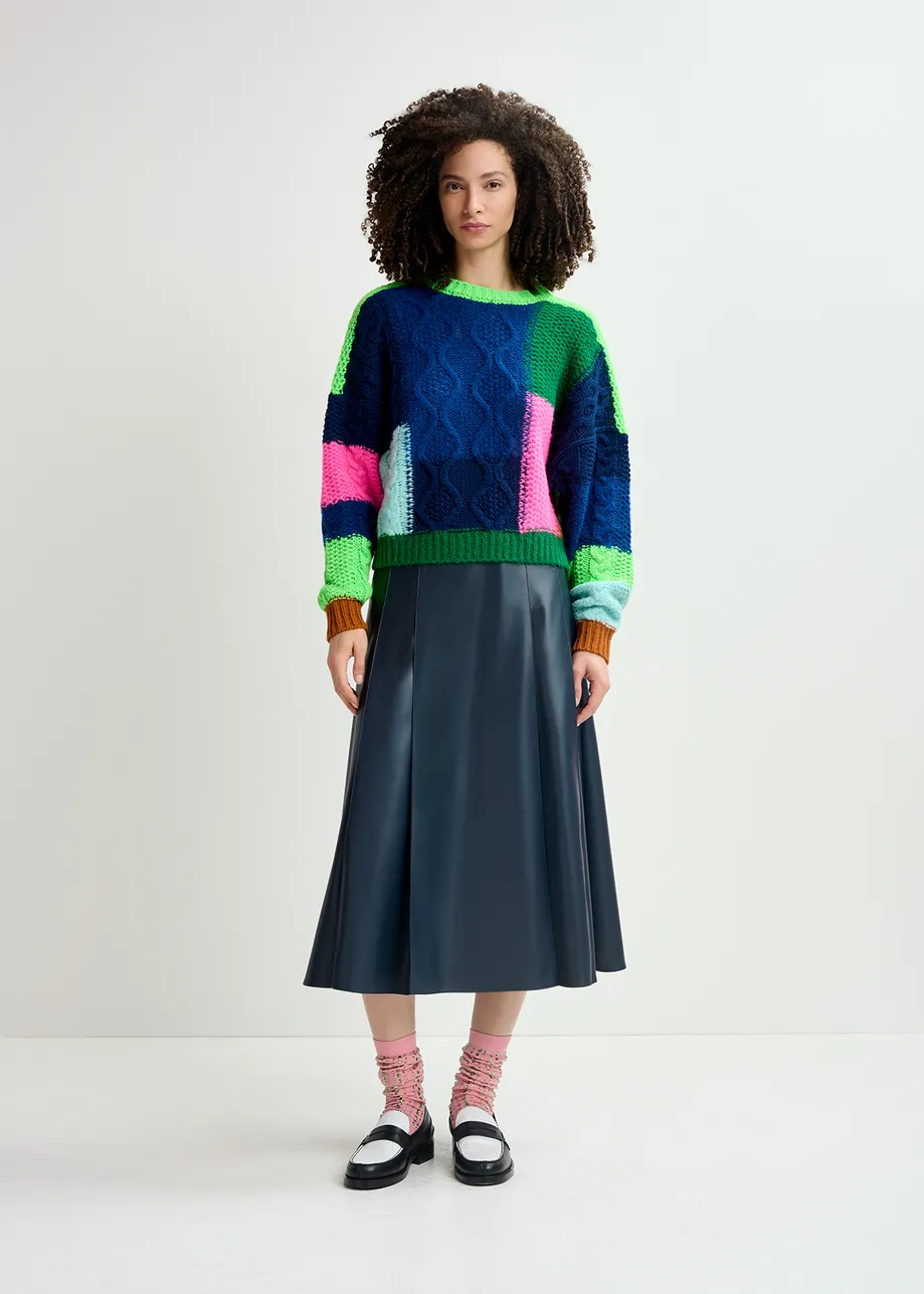 Navy blue, green and neon pink cable-knitted patchwork sweater