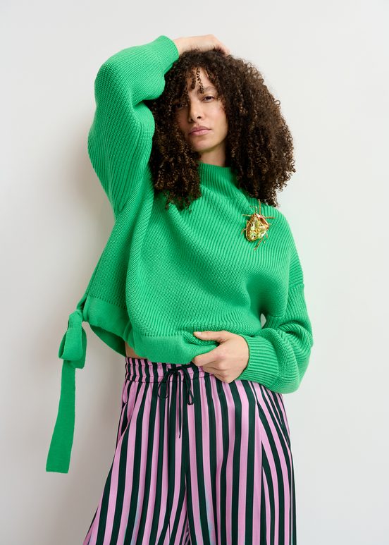 Green rib-knitted sweater with bows