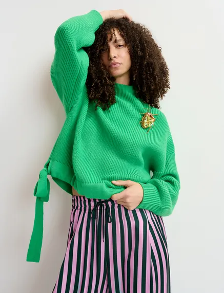 Green rib-knitted sweater with bows