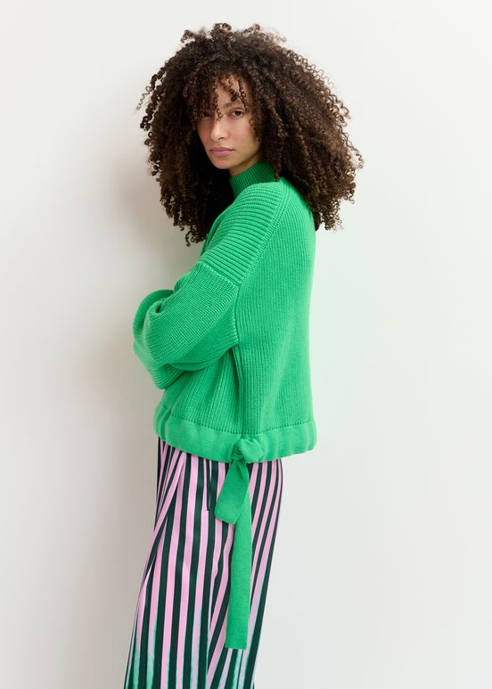 Green rib-knitted sweater with bows