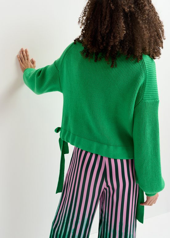 Green rib-knitted sweater with bows