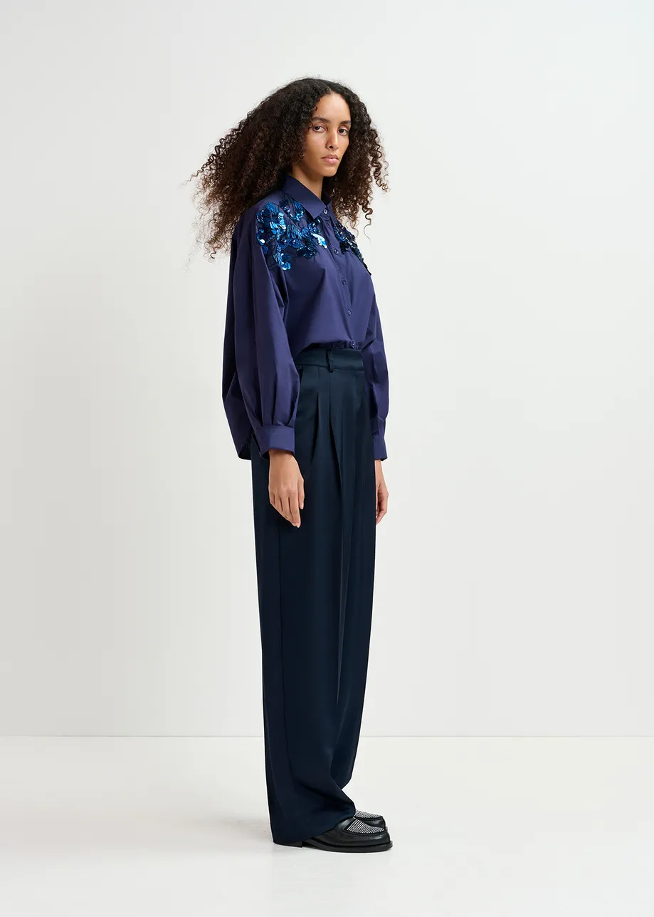 Navy blue tapered-leg satin pants