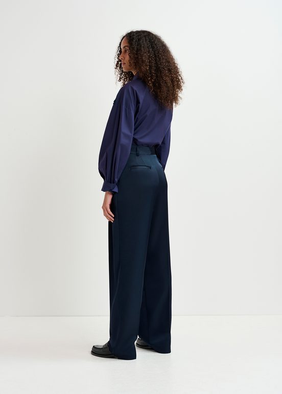 Navy blue tapered-leg satin pants