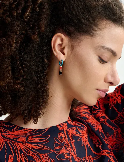 Blue hoop earrings with lipstick and poodle pendants