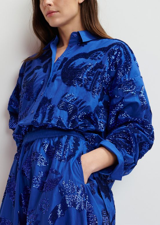 Camicia in cotone blu scuro decorata con paillettes