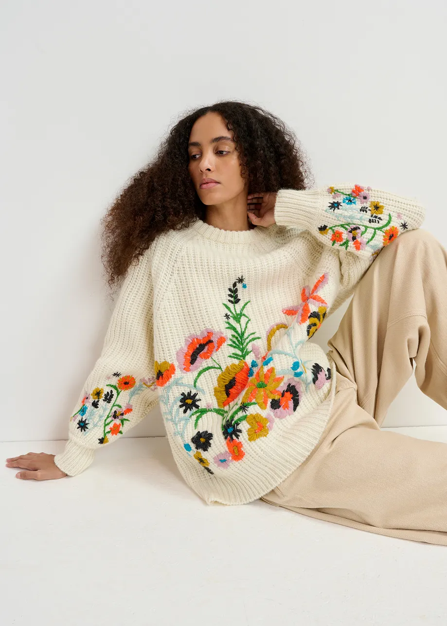 Ecru rib-knitted sweater with floral embroideries