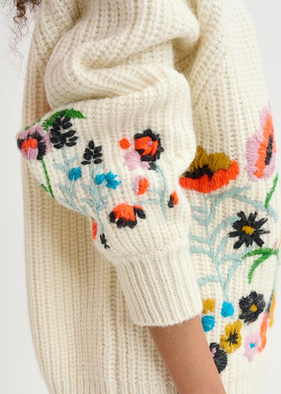 Ecru rib-knitted sweater with floral embroideries