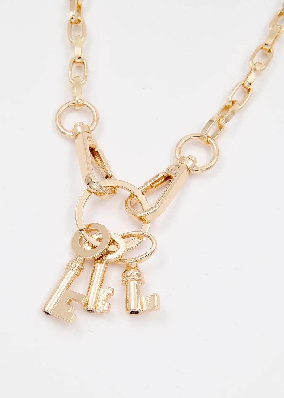 Gold-tone chain necklace with key pendants