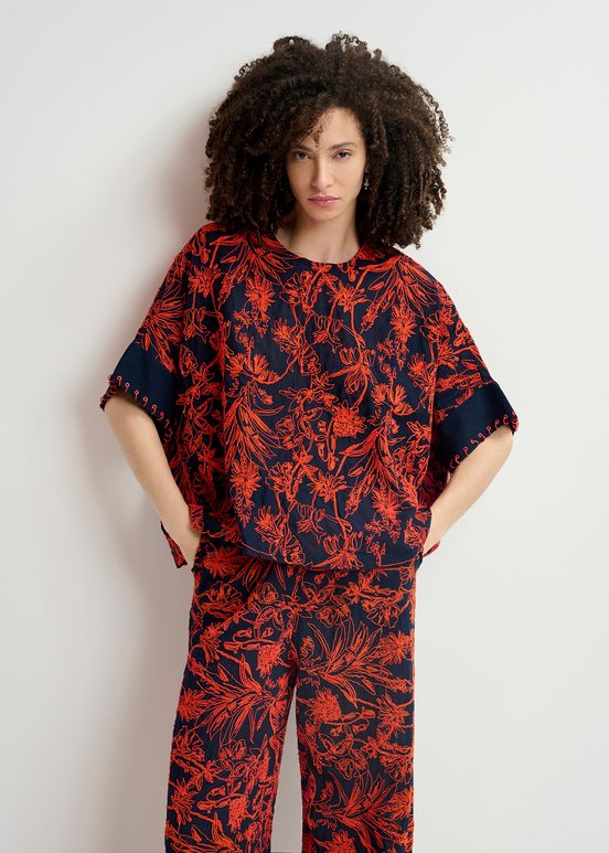 Navy blue oversized top with floral embroideries