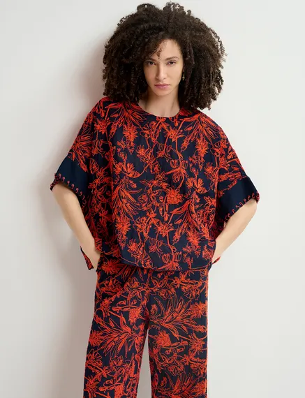 Navy blue oversized top with floral embroideries