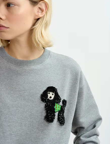 Grey organic cotton sweatshirt with bead-embroidered poodle