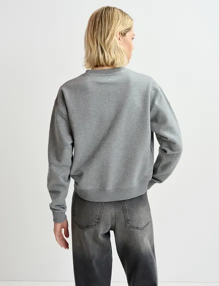 Sweatshirt gris en coton bio avec caniche en perles