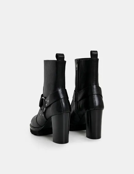 Black leather buckled ankle boots