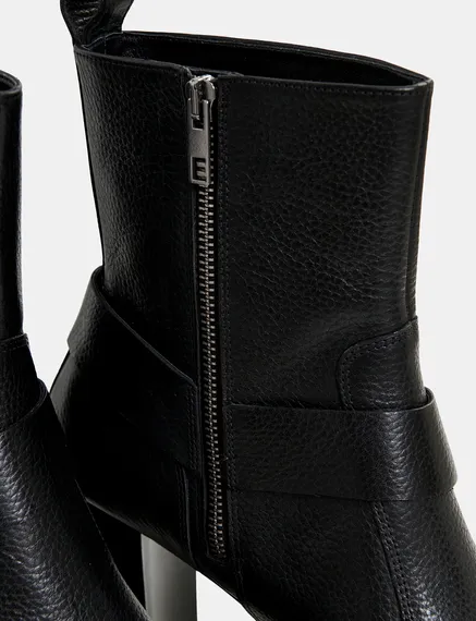 Black leather buckled ankle boots