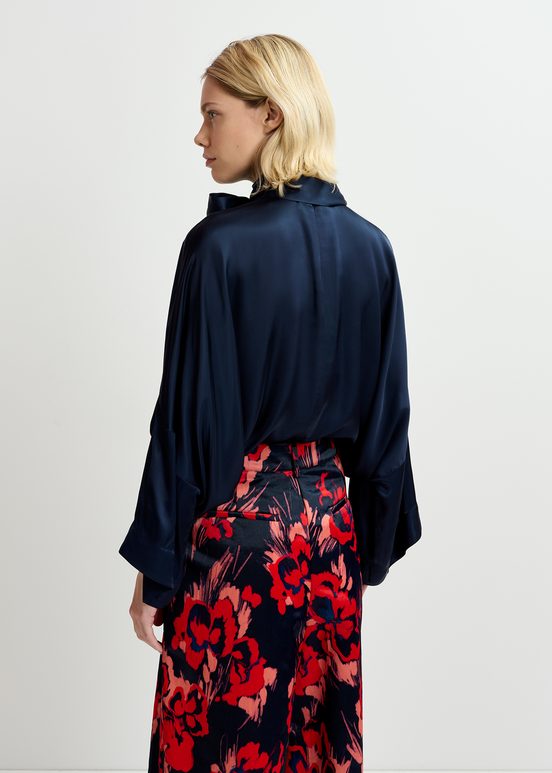 Marineblauwe oversized top met strikkraag