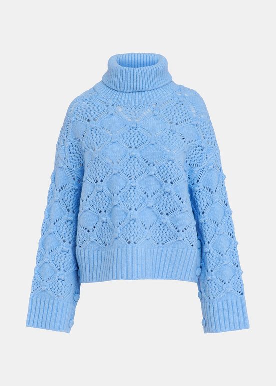 Blue cable-knit turtleneck sweater