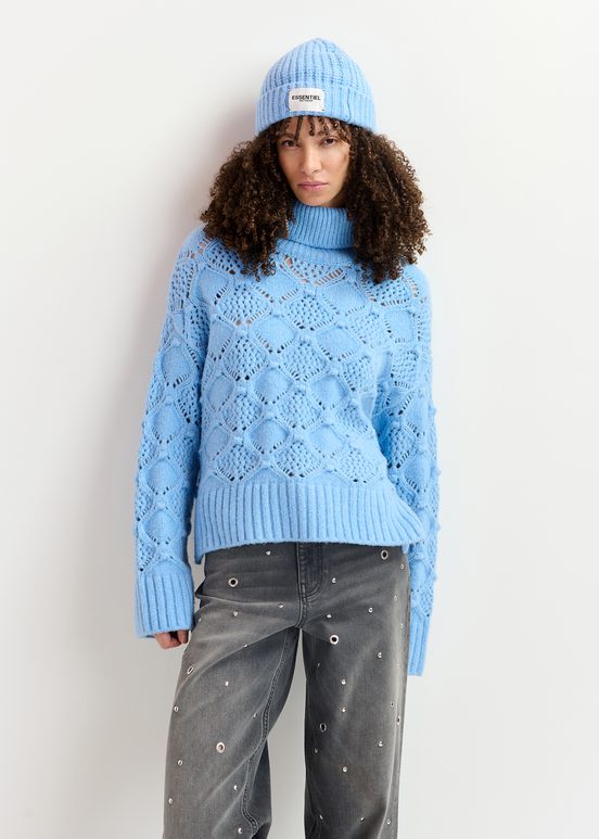 Blue cable-knit turtleneck sweater