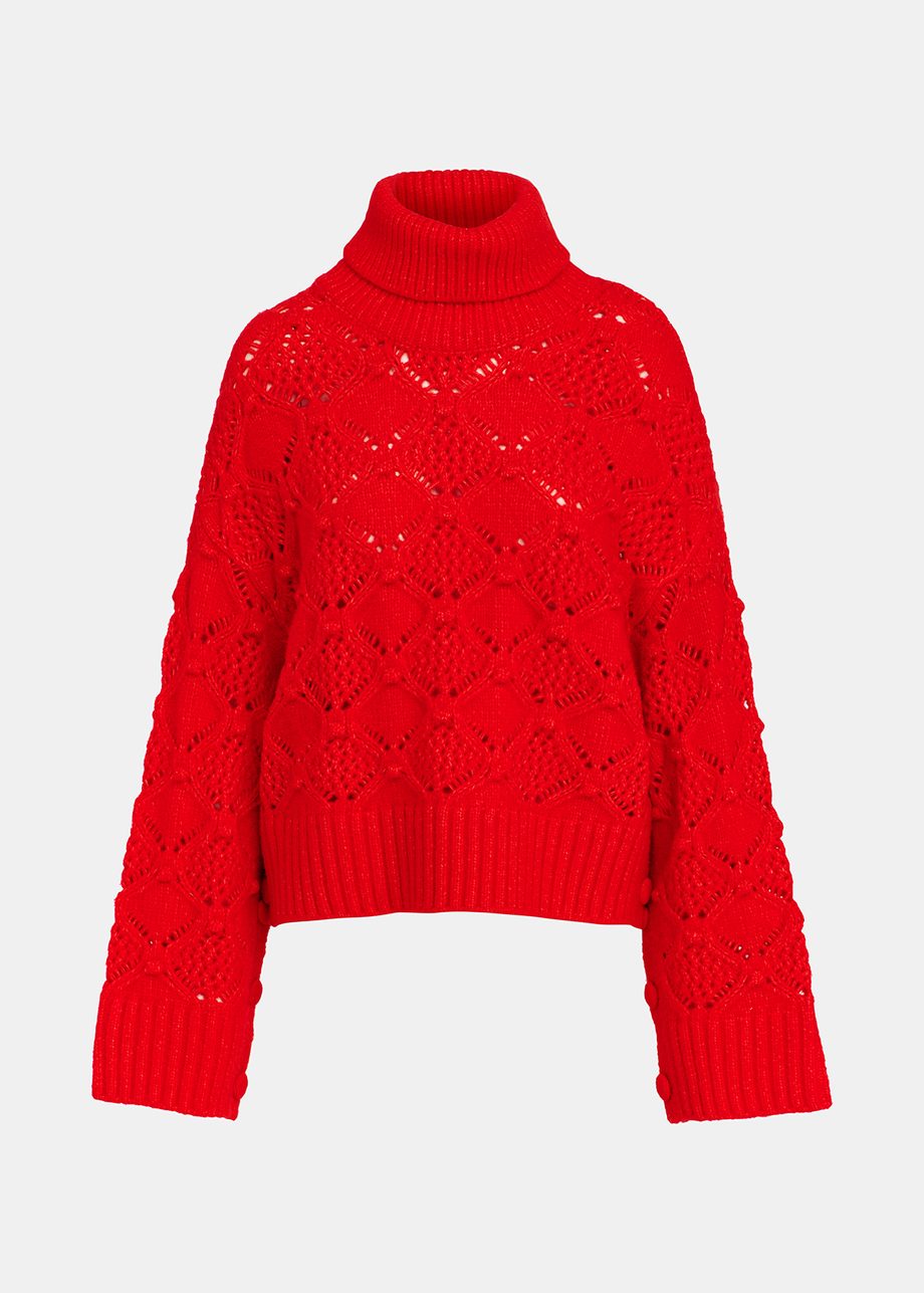 Red cable-knit turtleneck sweater